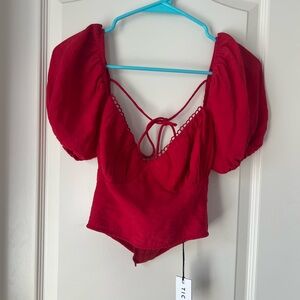 Red puff shoulder bustier top